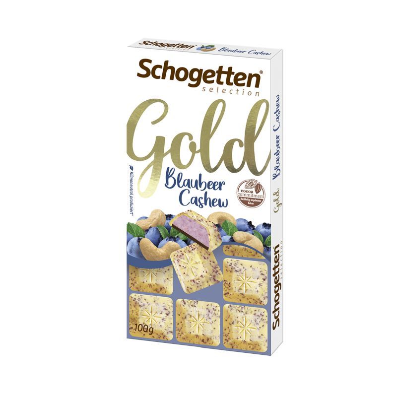 Ciocolată Schogetten albă cu umplutură cu aromă de afine și caju Gold